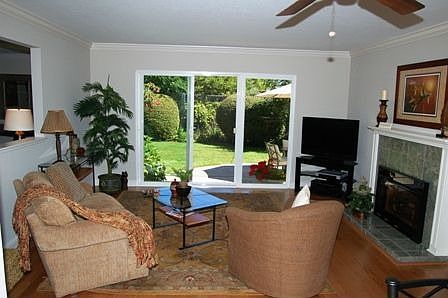 Family Room with Marble Front Fireplace