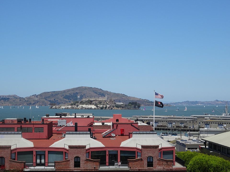 View of Alcatraz from the living room/small private balcony, and shared roof deck.