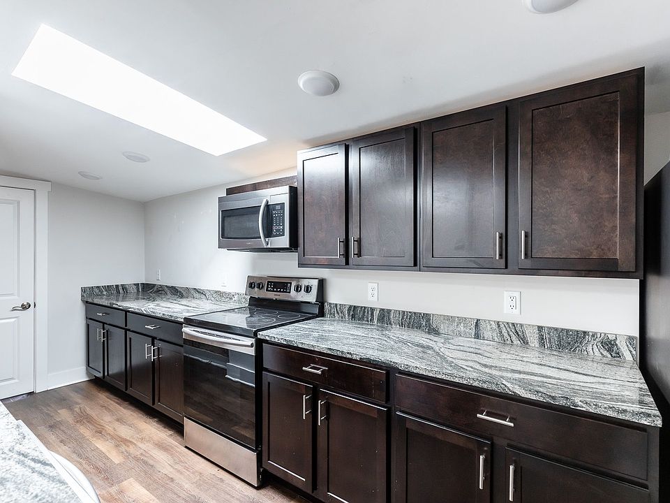 Solid wood cabinetry and granite counters.