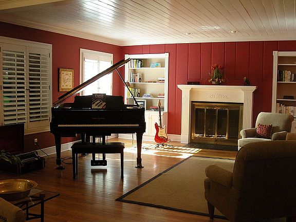 Fireplace on each end, built-in bookshelves