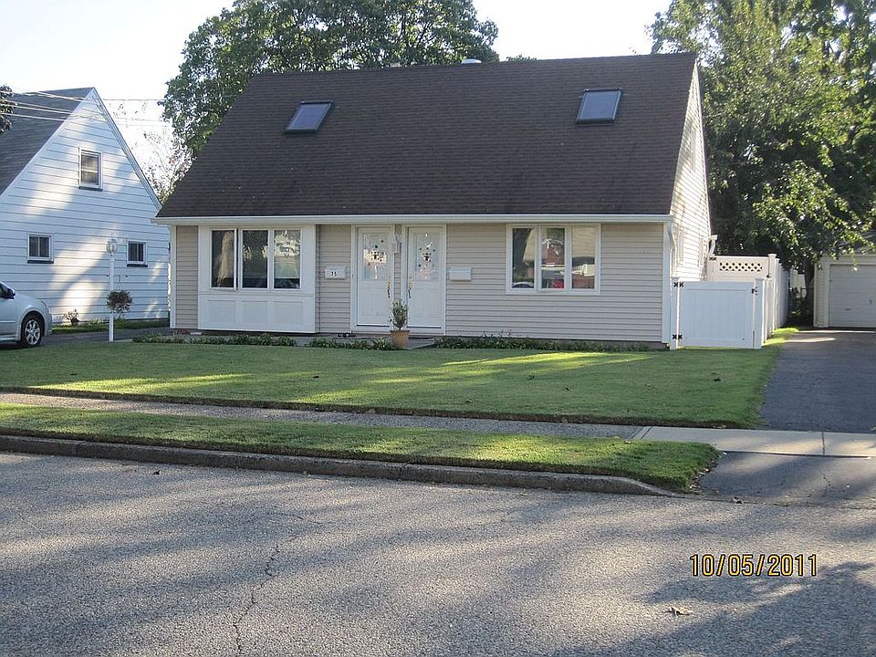 NEW VINYL SIDING & WINDOWS