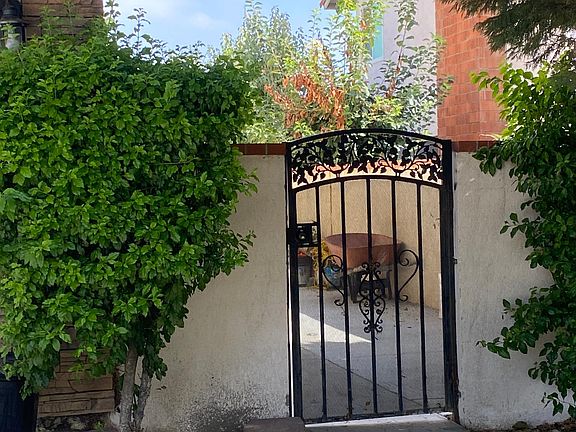 Gate that leads you to the unit in the rear.