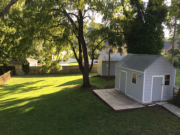 Back Yard- 2 sheds, 1 with A/C