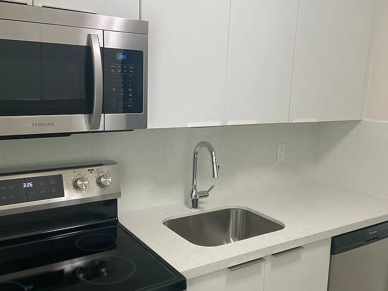 GEM COVE APARTMENTS — Photo 11