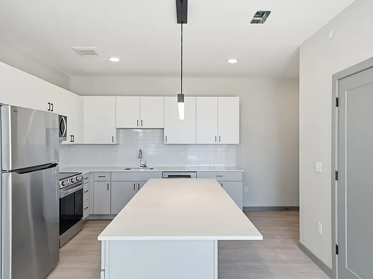 A4 _ One Bedroom plus Den Kitchen and Living