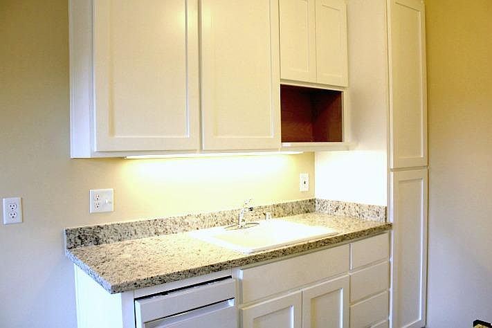 #310 It also has a new dishwasher and a shelf for your microwave