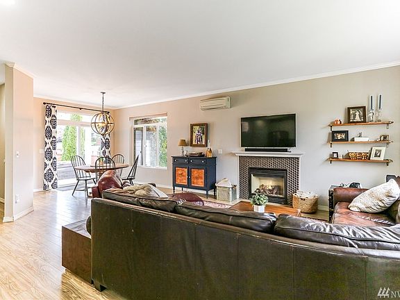 Open the front door into a open concept living room. 