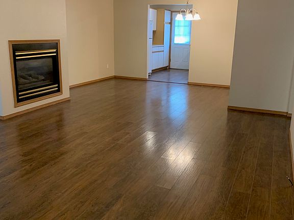 Entry at Livingroom to Dining room, to Kitchen, and back patio door.