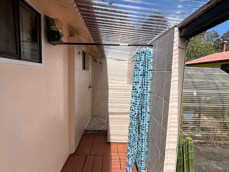 Bonus private outdoor shower. Access via side door from laundry room to side deck.