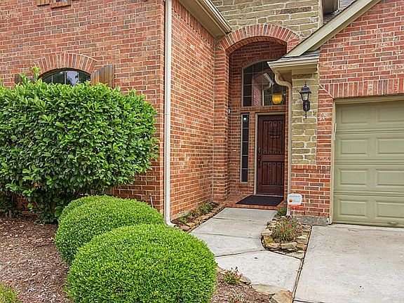 Beautifully landscaped front and walkway