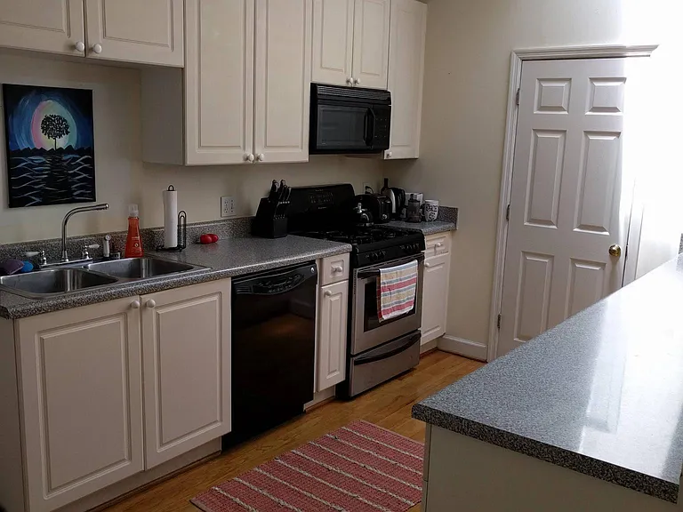 Gas Cooking, dishwasher, garbage disposer, lots of cabinet storage, hardwood floors, Skylights, separate laundry room.