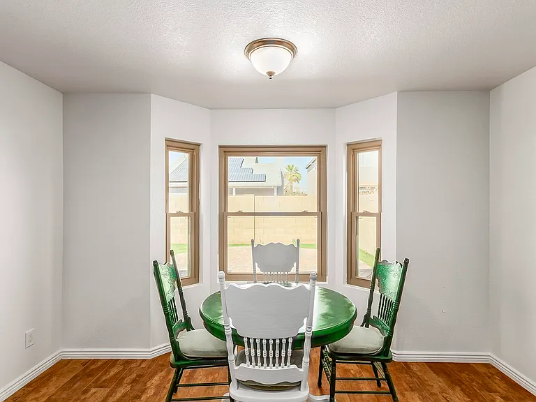 Kitchen table with nice bright view of back yard