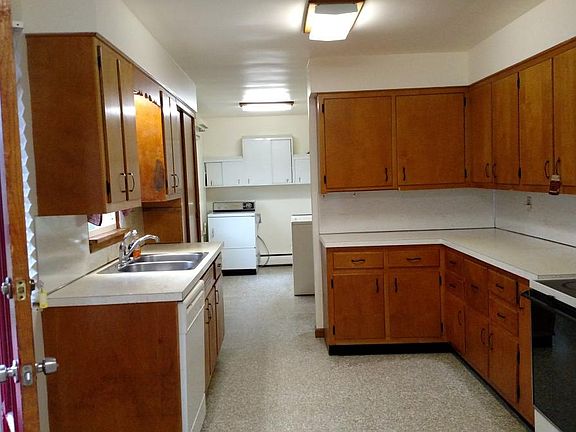 Kitchen includes, fridge, stove, dishwasher