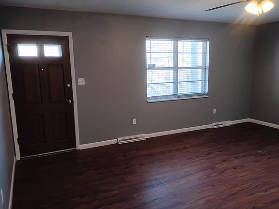 Upstairs living room facing front entry