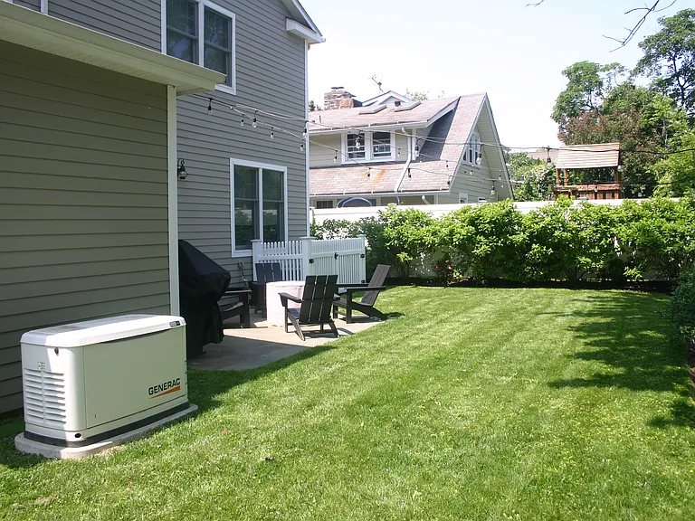Rear yard with automatic standby emergency generator