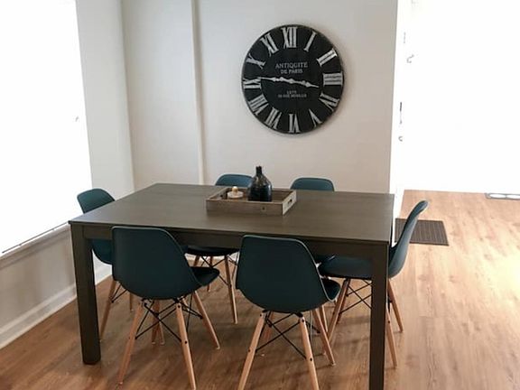 Dining area with seating for six. Also makes a great workspace!