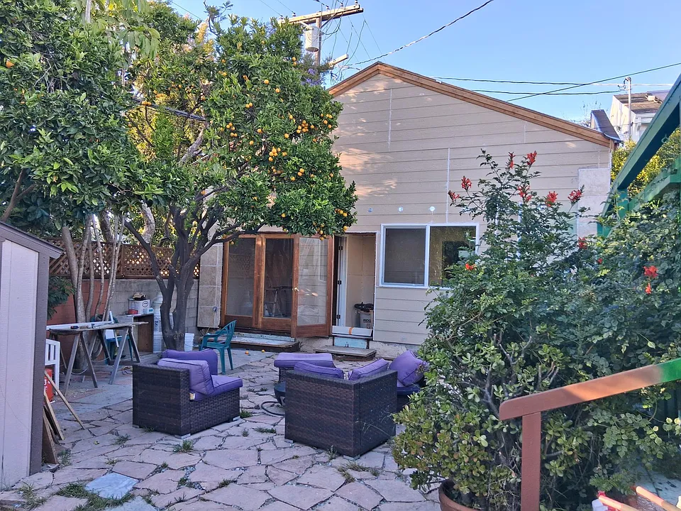 Private yard looking at ADU kitchen and master bedroom