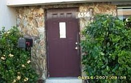 Front door set in stone fascade