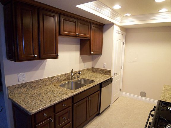 New Cabinets, Granite Stainless Appliances, Tile, Pantry, Recessed Lighting.