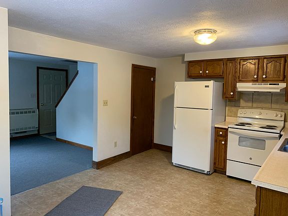 Kitchen with view of living room