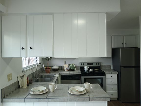 Breakfast bar view of galley kitchen