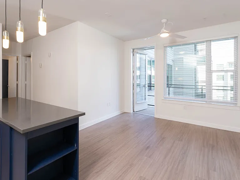 Living Room with Balcony and Hard Surface Flooring