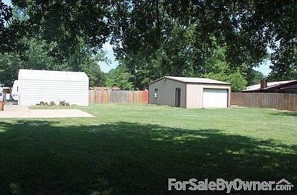 Back Yard
						:
						Back yard with shop and side view of carport