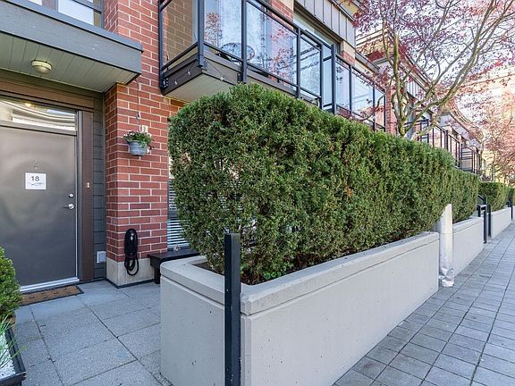 Entrance to unit with front porch