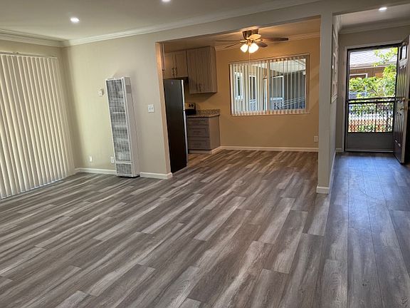 Living room and dining room looking towards the front door