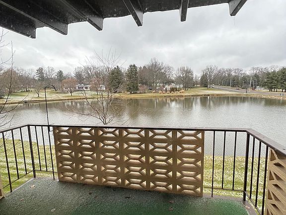 Patio with view of lake
