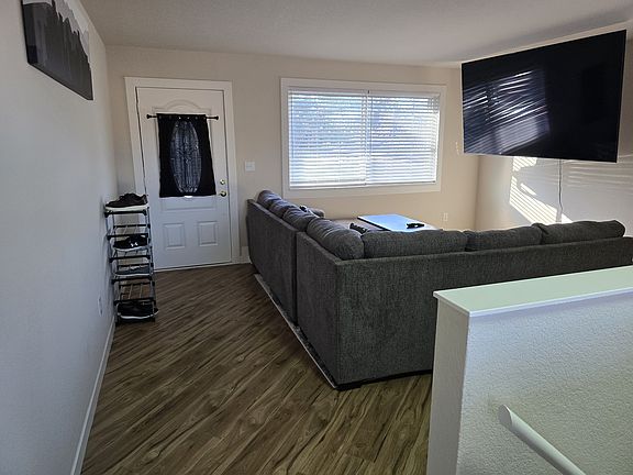 Upstairs Living room with 75-Inch Smart TV.