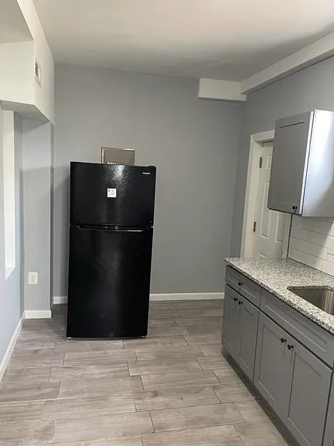 Building Photo - 3629 W Garrison Ave #1
