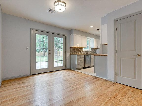 Open concept with beautiful French doors that open to a large patio. "Hall Closet" can also be used as a pantry.