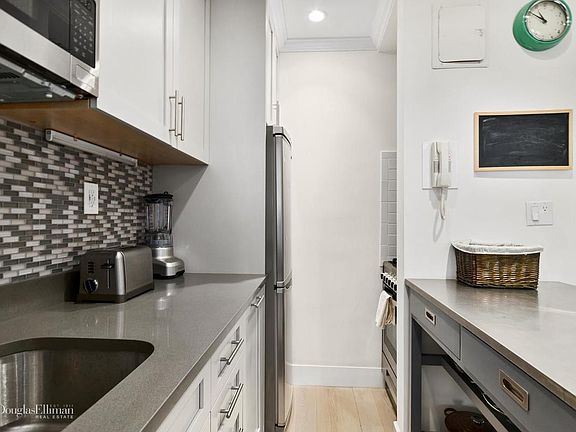 4th image of 67 E 11th St APT 218