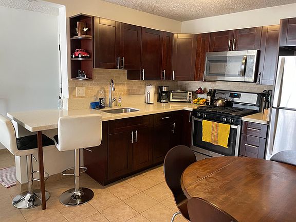 Gas stove, full size refrigerator, microwave, toaster oven. All cooking and utensils and place settings included