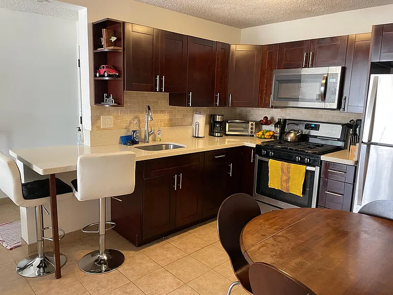 Gas stove, full size refrigerator, microwave, toaster oven. All cooking and utensils and place settings included