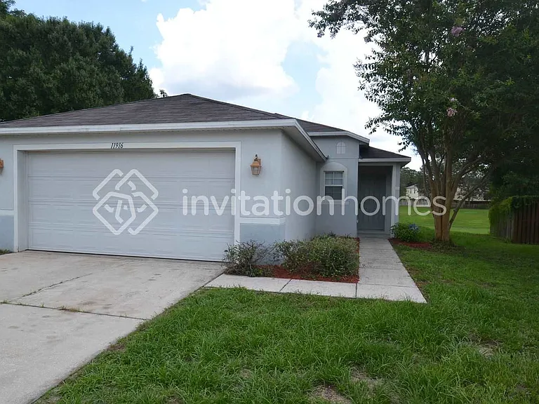 11916 Mango Groves Blvd — Photo 1