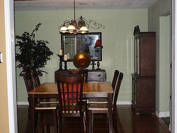  Formal dining located just off the family room is perfect for family gatherings., study or other flex space.