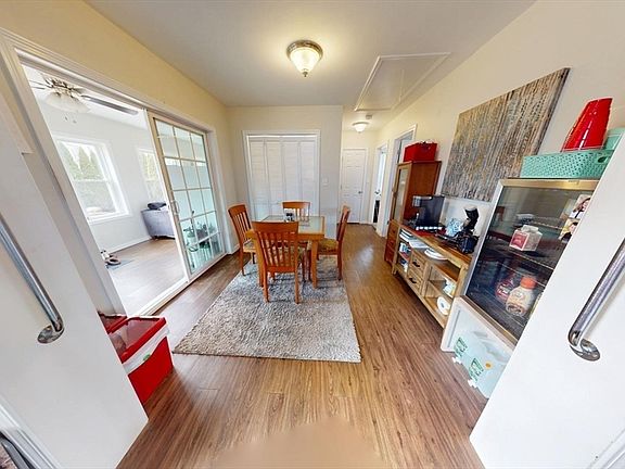 The glass door for the sunroom is on the left. This will be covered with drapes for your privacy.