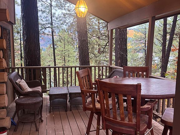 Sit under the covered deck.