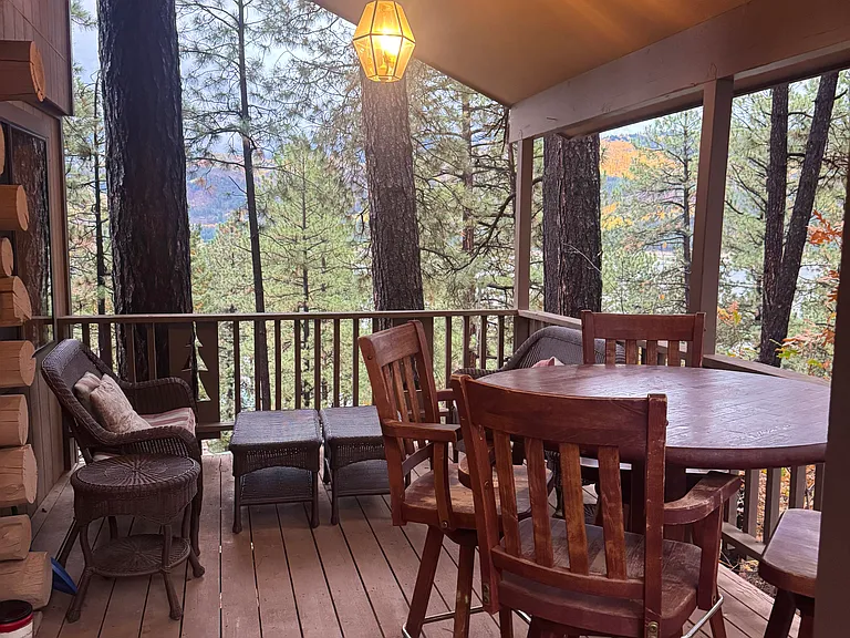 Sit under the covered deck and view the mountains!