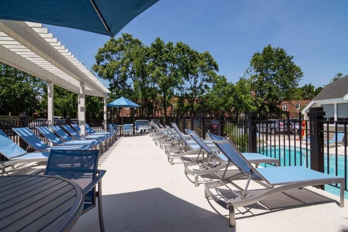 Sparkling Pool & Sundeck with Relaxing Lounge Chairs