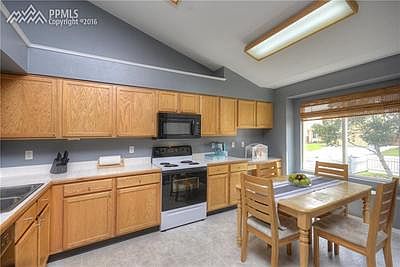 Plenty of counter and cabinet space in this spacious kitchen.
