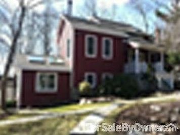 Living Rm cathedral ceiling French Doors
						:
						Enjoy cozy evenings by the fireplace. Open the doors to deck and woods views.