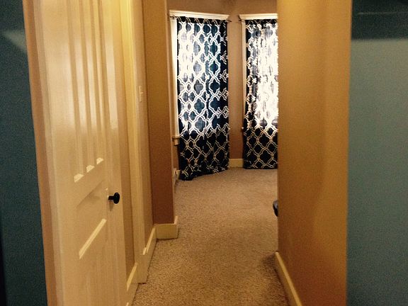 Hallway with large deep closet