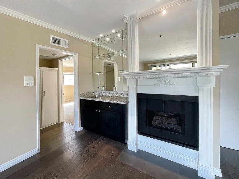Custom wet bars with shelving in select units