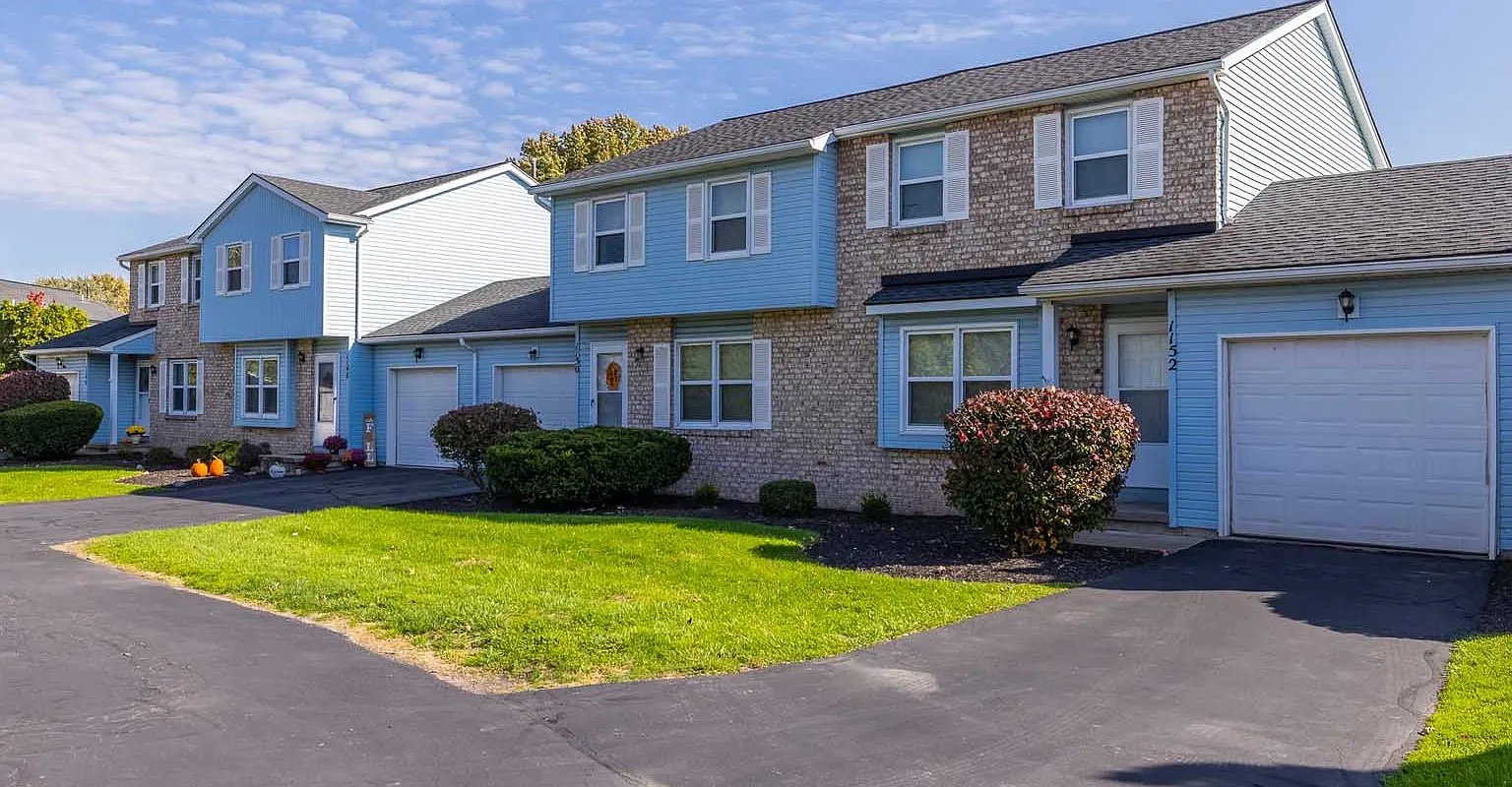 New England Village Townhomes — Photo 1
