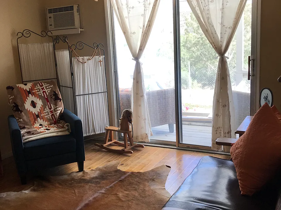 Living Room with pasture, river and mountain view