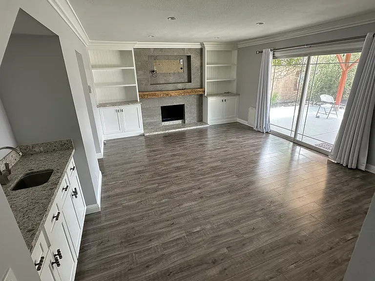 DOWNSTAIRS BAR/FIREPLACE/LOWER LEVEL ROOM