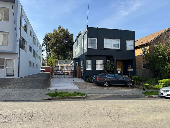 The loft sits in the back of this building with an automatic gate opener